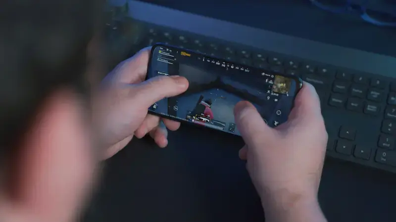 person holding black Samsung Android smartphone